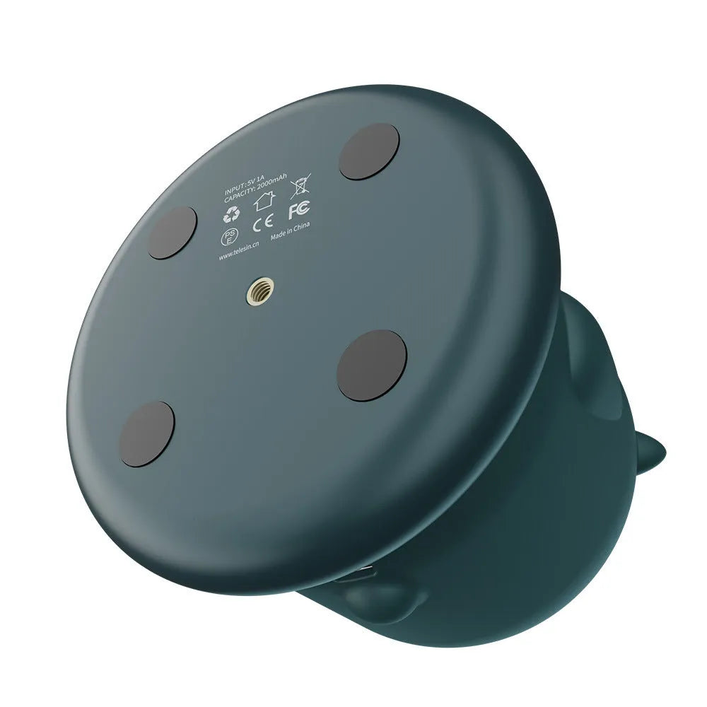 Dark green intelligent follow-up gimbal with built-in camera showing 360-degree rotation mechanism