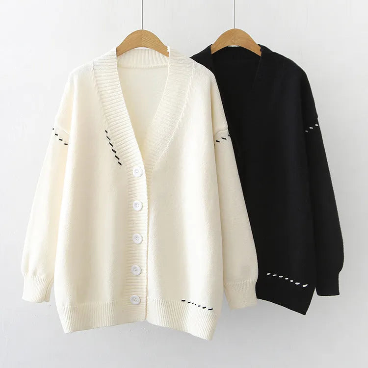 Women's loose knitted cardigan coat in black solid colour with long sleeves