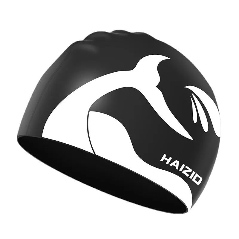 Silicone swim cap with whale tail pattern and waterproof ear protectors in four colour options.