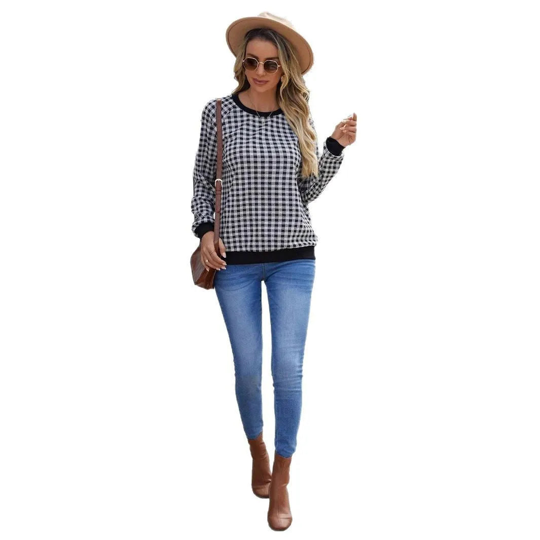 Black long sleeve pullover sweater with a printed Japanese plaid pattern