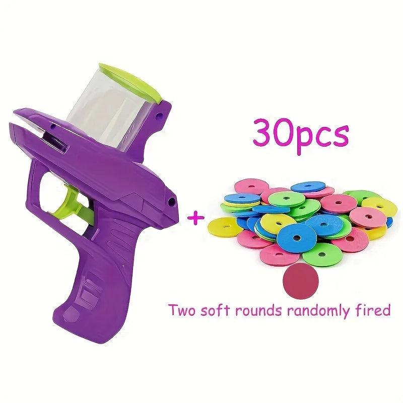 Green durable plastic cat toy launcher with a foam disc ready for launch.