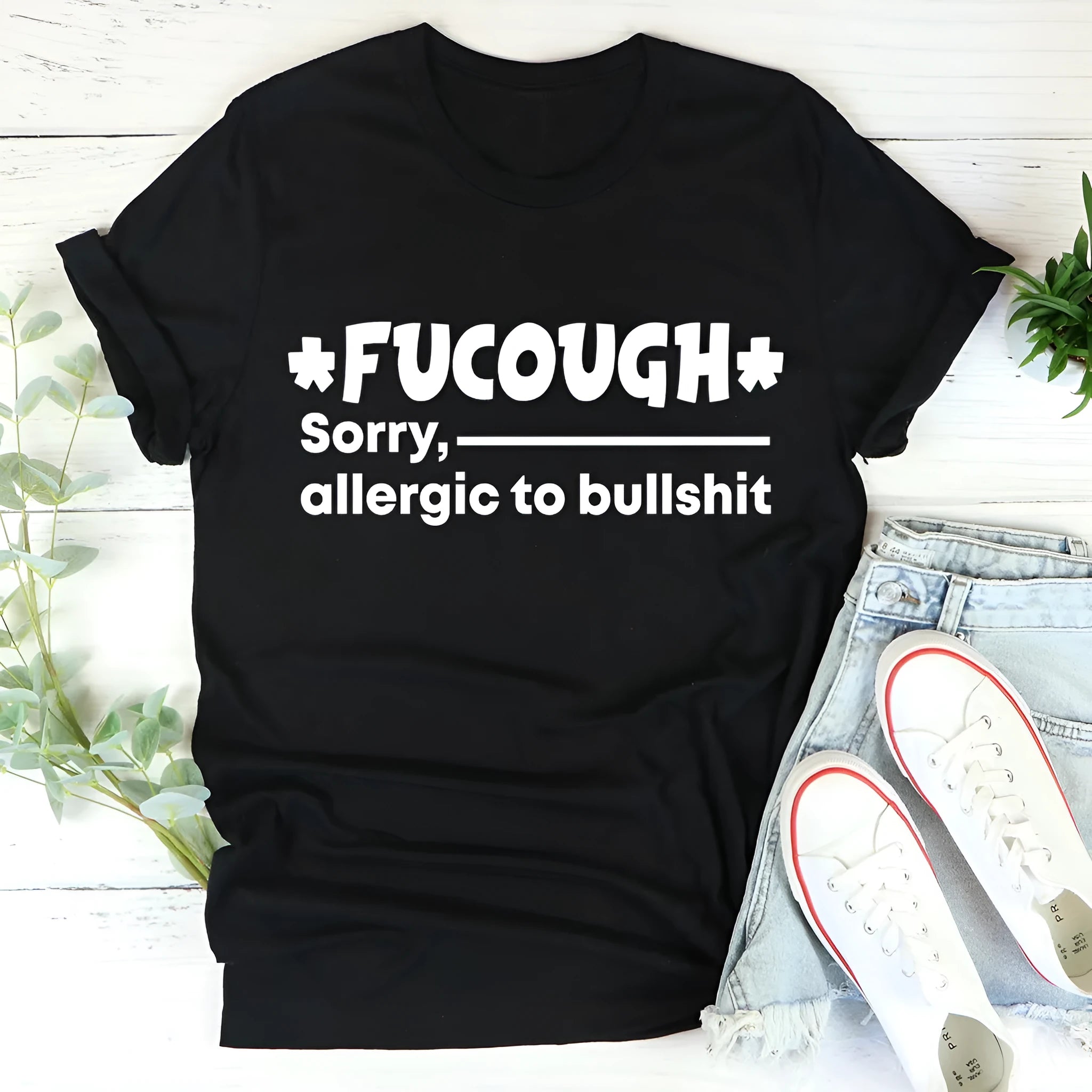 Black cotton t-shirt with short sleeves and round neck on mannequin
