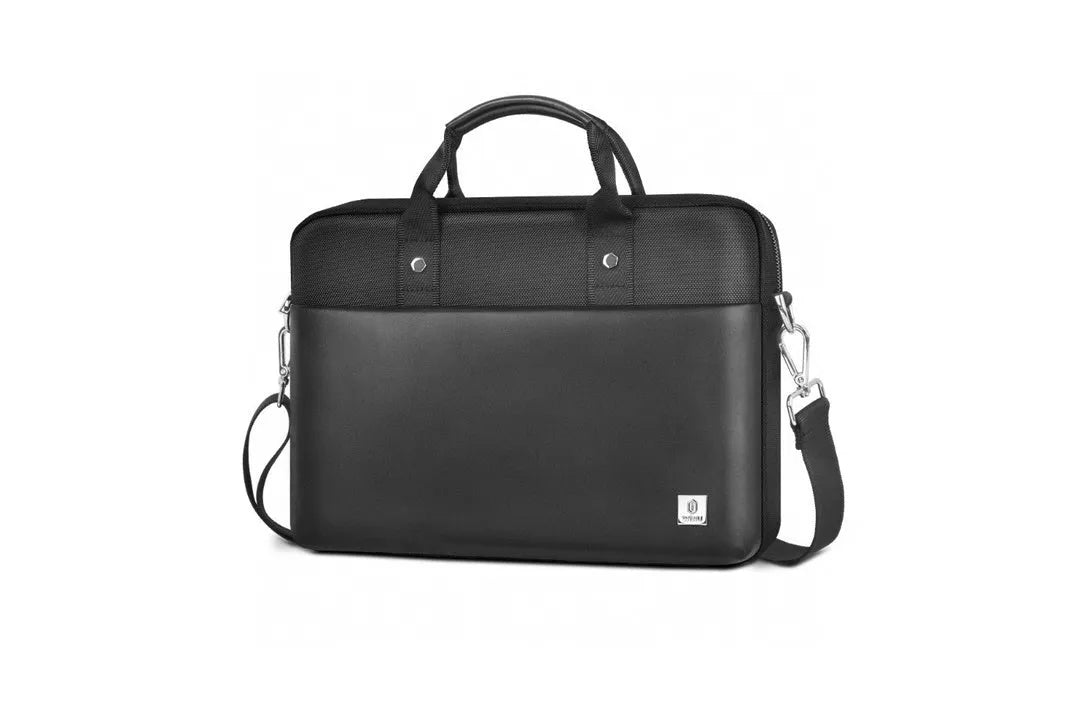 Black Oxford cloth laptop rucksack showing multi-pocket interior and separate computer compartment for 14 or 15.6 inch devices.