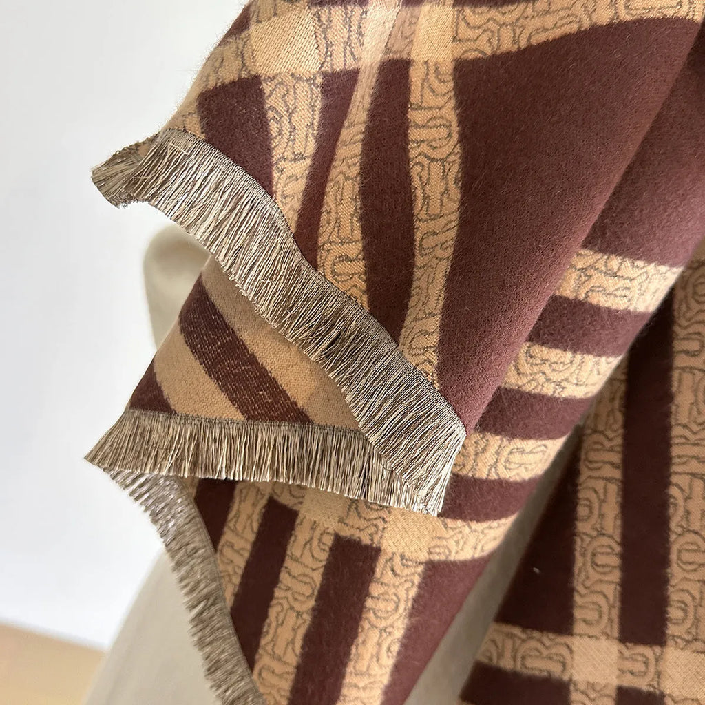 Long brown imitation cashmere scarf with tassel ends laid flat showing its full 185cm length.