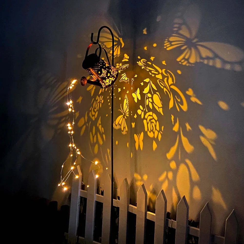 Solar garden lamp with tapered butterfly pattern in iron construction, warm white LED light
