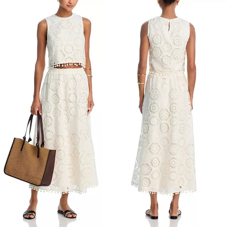 White women's retro style suit with sleeveless top, long skirt and embroidery detailing