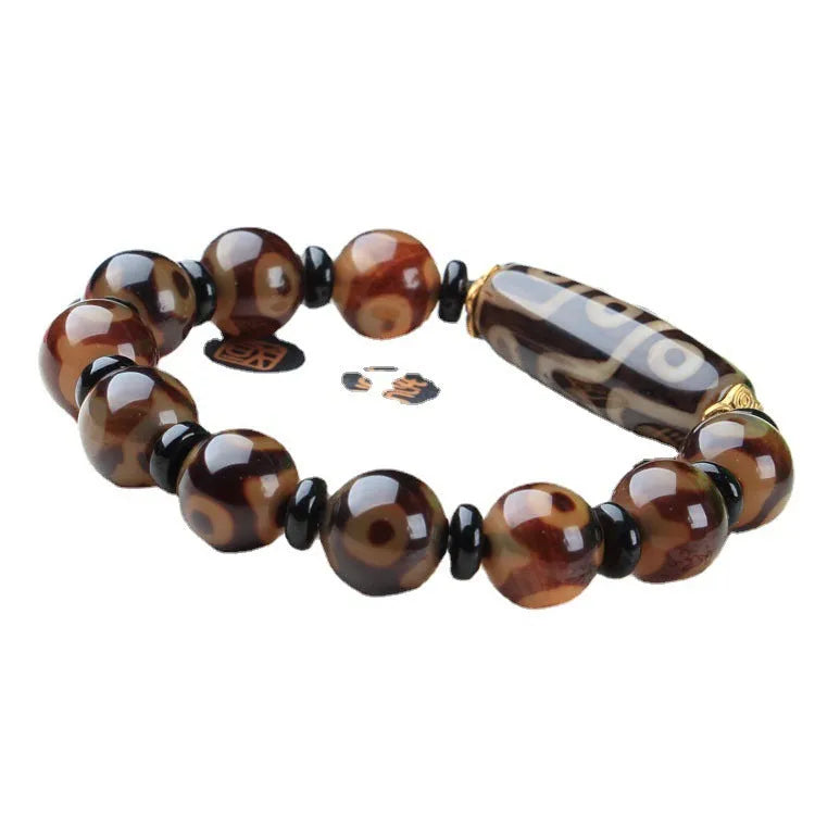 Distressed agate Tibet beads bracelet with three eye dzi design and polished stone beads