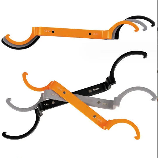 Orange, grey, and black magnetic crescent wrenches with catheter locking mechanism on one tool