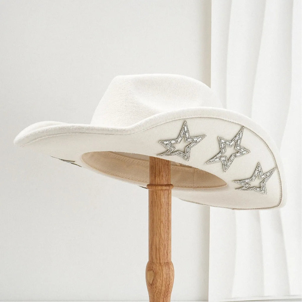 Brown polyester Western denim top hat with a conical crown and a silver hexagonal star decoration on the front.