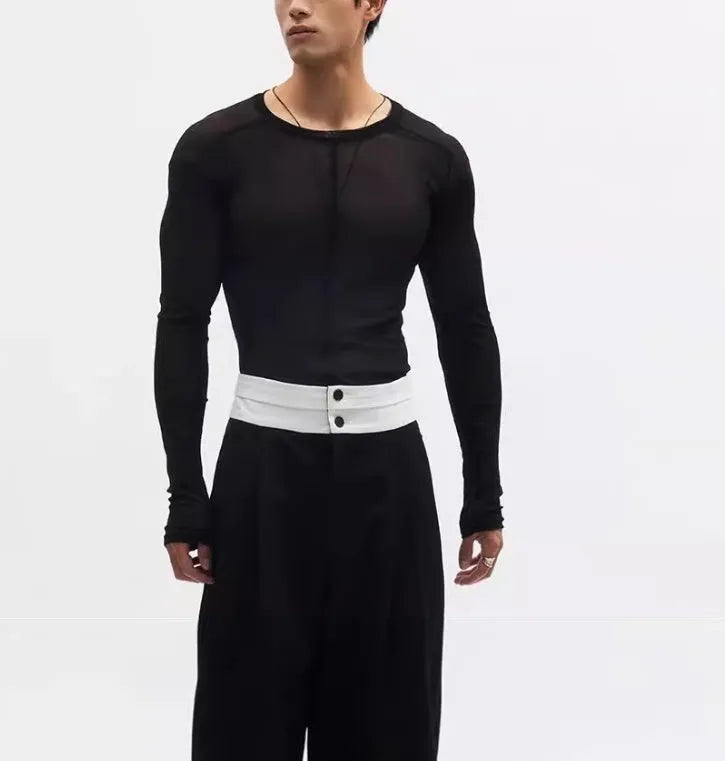 Black mesh slim-fit long sleeve PU pullover top with round neck on a model