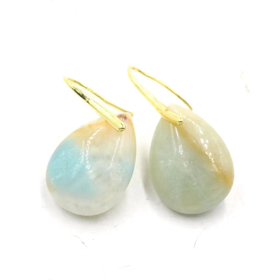 Geometric water drop shaped crystal earrings with electroplated finish in a selection of colours.