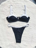 Women's low waist black bikini swimsuit with stitching split detail and briefs style.