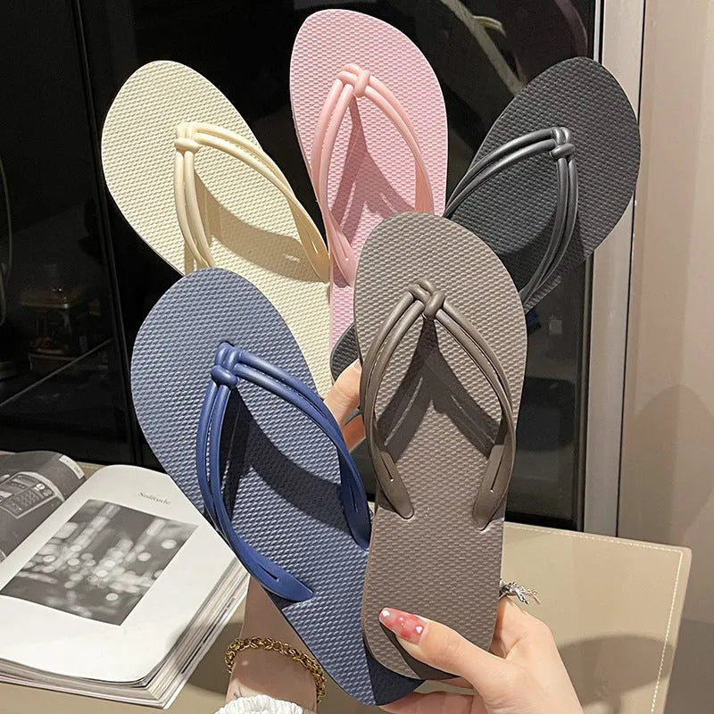 Men's casual PVC flip flops in beige with toe-covering style and injection moulded sole.