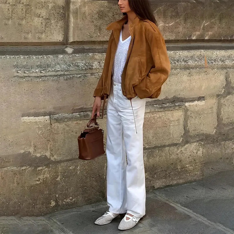 Man wearing a solid colour retro-style loose-fit polyester jacket