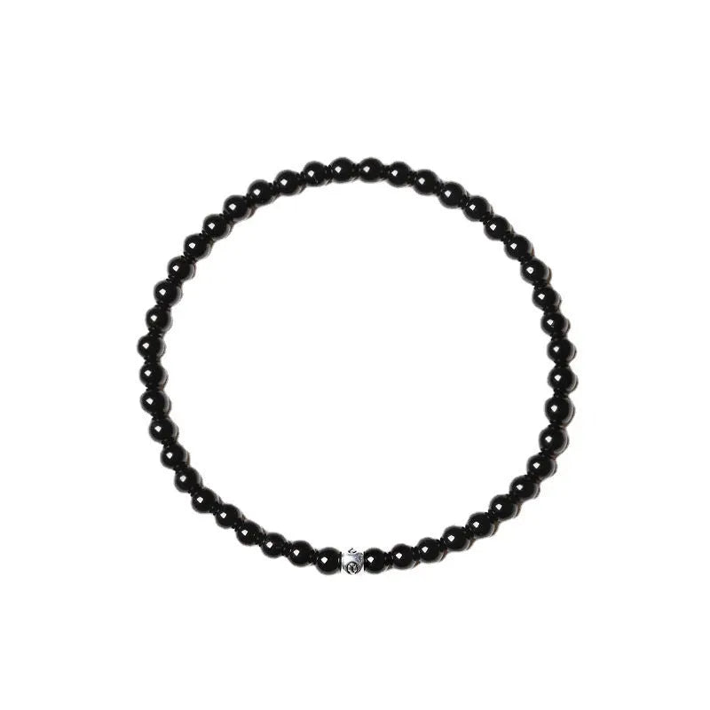 Geometric agate bracelet with obsidian, blue san and cut surface black agate beads