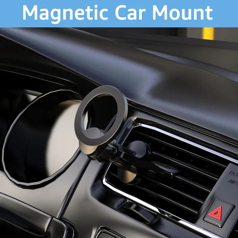Black magnetic car phone holder attached to vehicle air vent