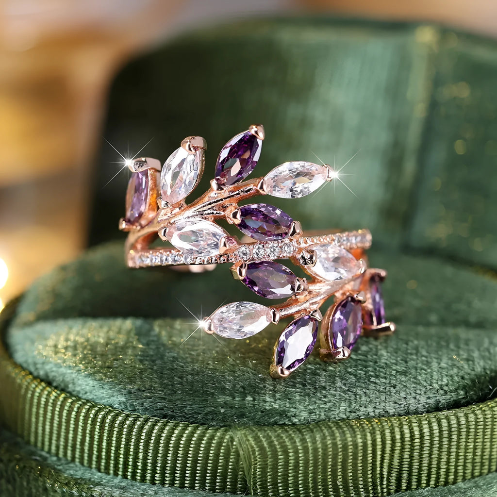 Adjustable horse eye design leaf ring in copper with zircon crystals, shown in a rose gold finish