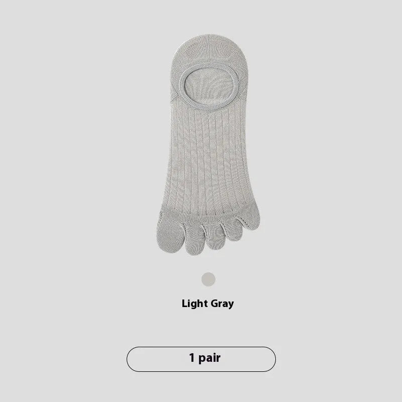 Men's grey five-finger invisible socks laid flat, showing individual toe separations and low-cut design.