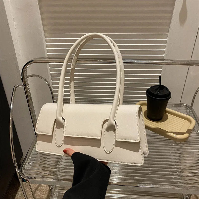 Women's retro small square shoulder bag in PU leather with horizontal design and stitching details