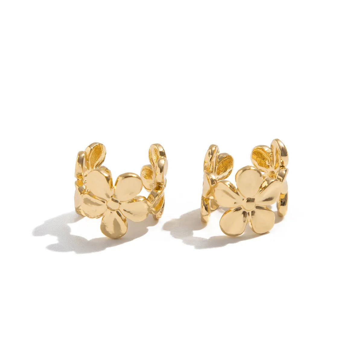 Gold electroplated women's earrings with starfish and conch beach-themed animal zodiac modelling