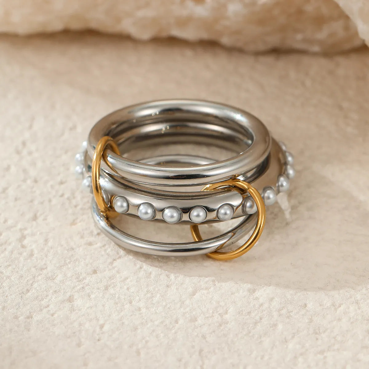 Stacked stainless steel rings with 18K gold plating in free size for women