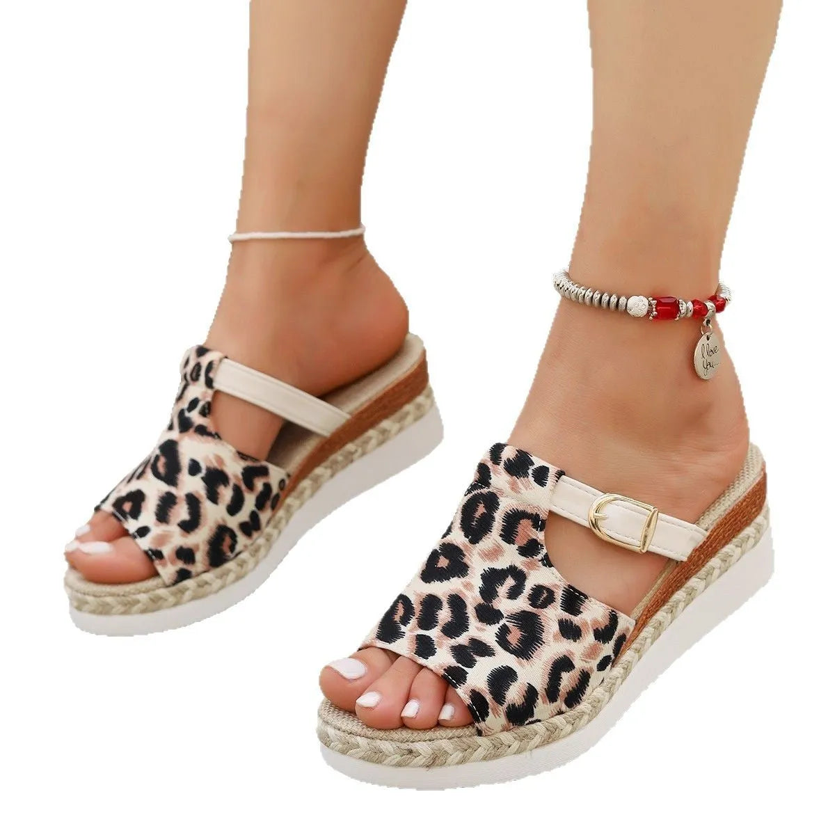 Women's beige leopard print wedge platform sandals with fish mouth open toe on a light background.