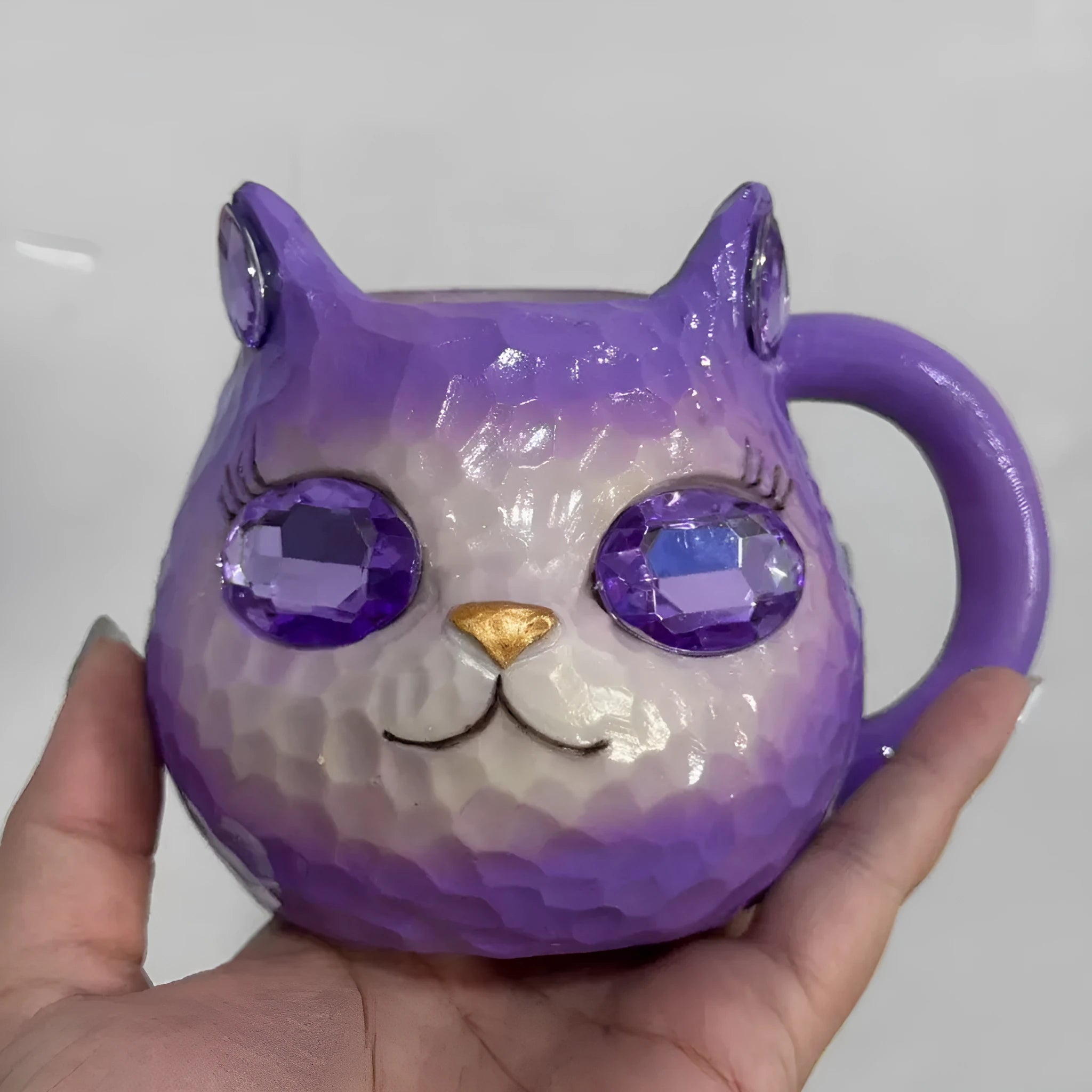 American style decorative resin cat cup available in blue, green, pink and purple colours.