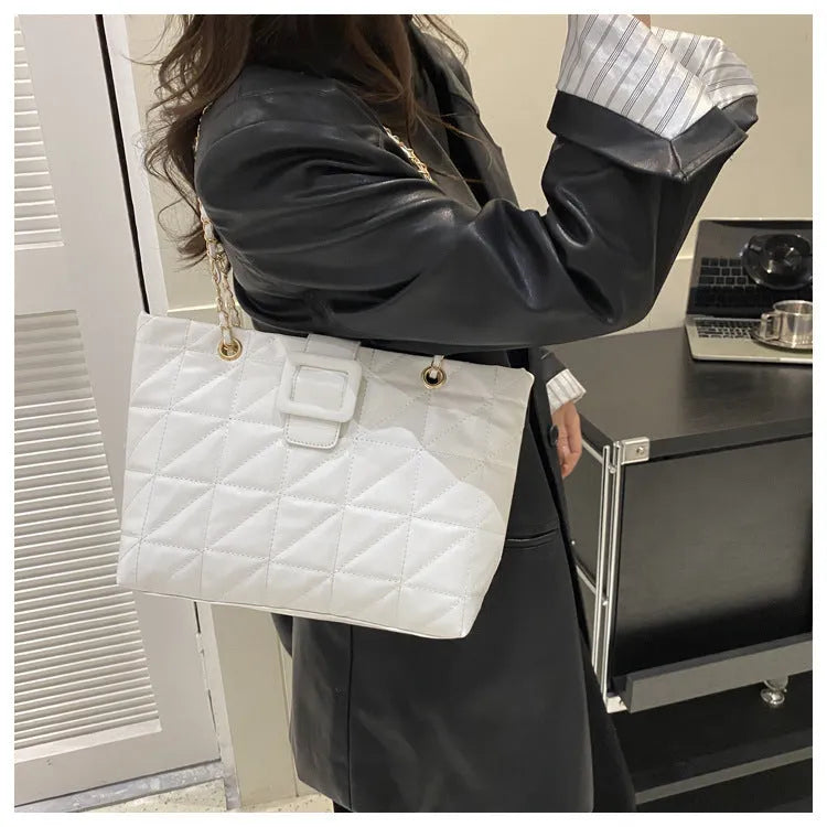 Women shoulder bag in trapezoid shape with chain strap, PU material, three-dimensional pocket, available in black white khaki brown