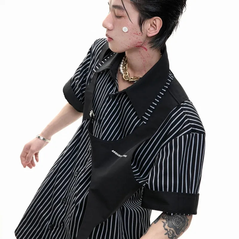 Man modelling a black and white striped cotton shirt with a double collar design and short sleeves.