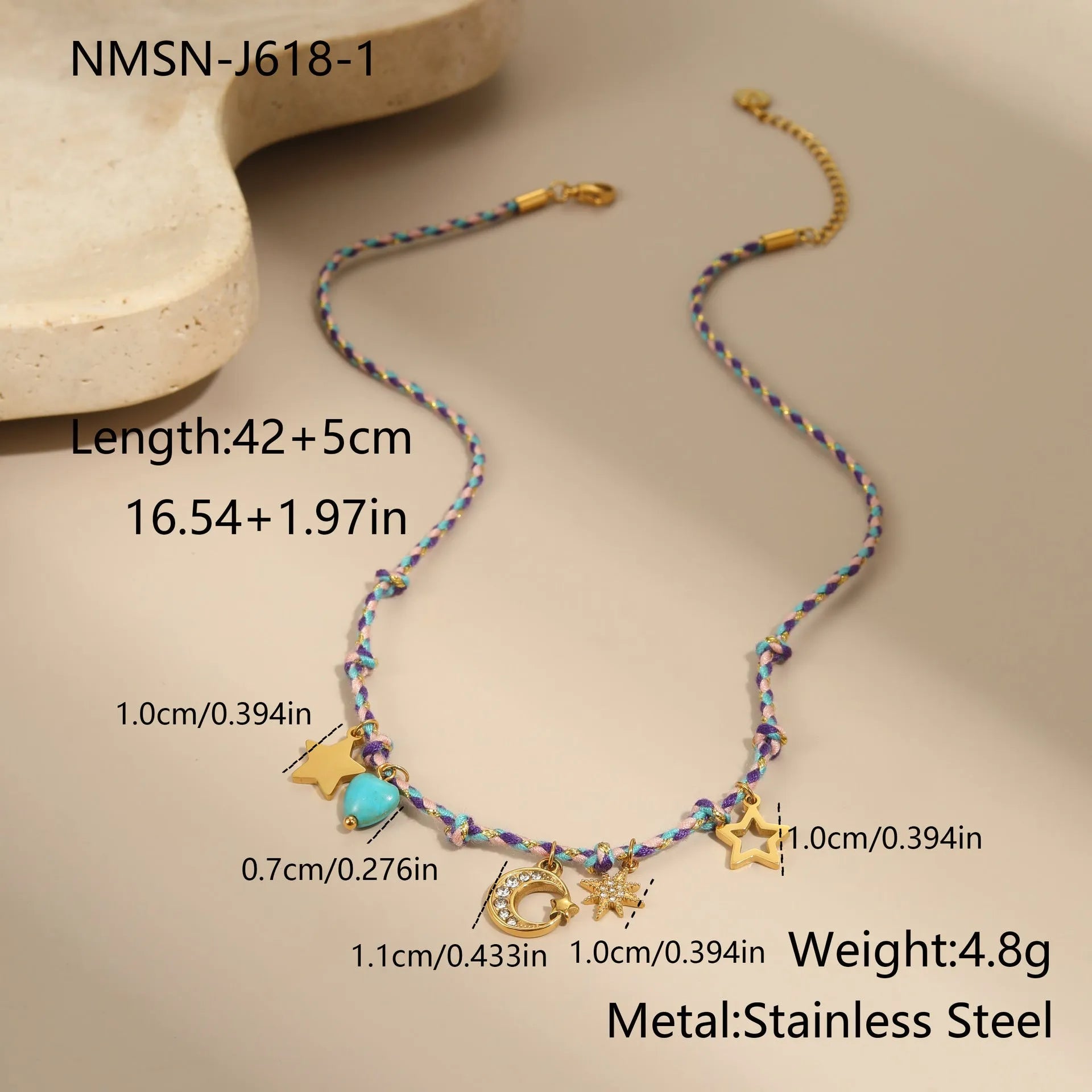 Braided rope chain stainless steel necklace with heart pendant and 18K gold plating on a model.