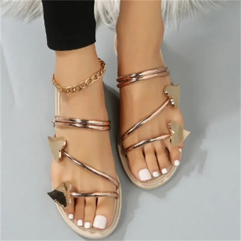 Heart shape flat slippers for women in gold colour with foam sole