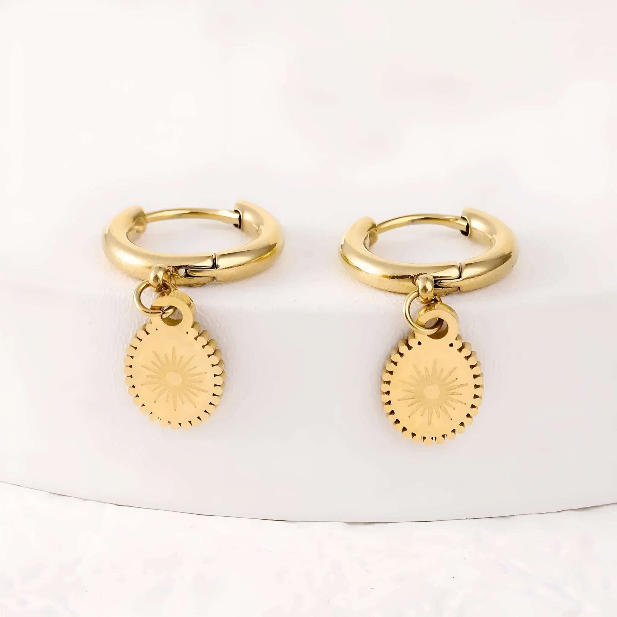 Geometric stainless steel earrings with elliptical design and ear button backs in colour XY-EH005