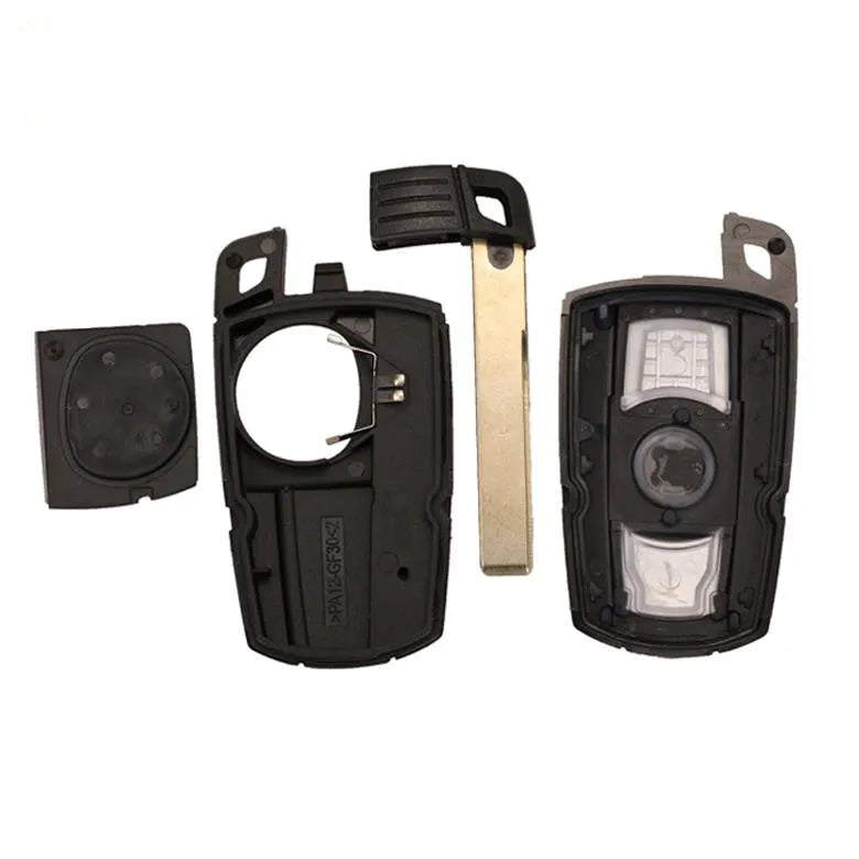 BMW semi-intelligent three-button remote car key fob in metal and plastic.