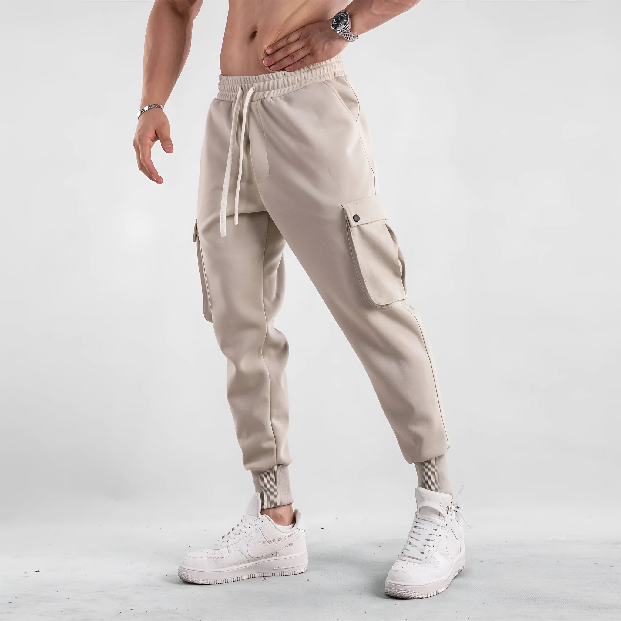 Men's loose fit cotton sports trousers with ankle tie detail and multiple pockets in various colour options