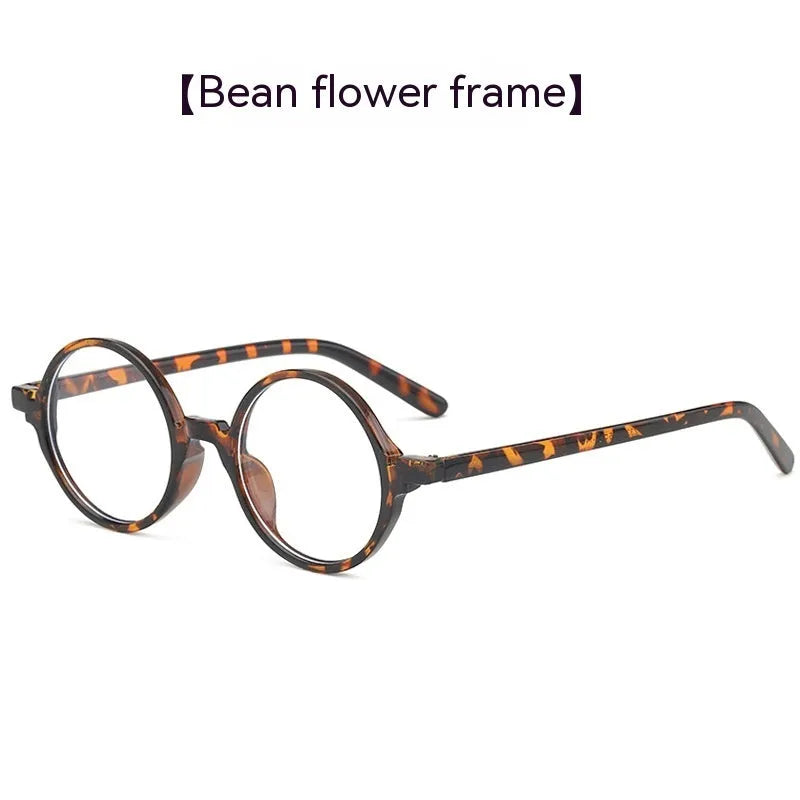 Round retro glasses with artistic frame in four colour options: bright black, sand black, tofu pudding, transparent grey.