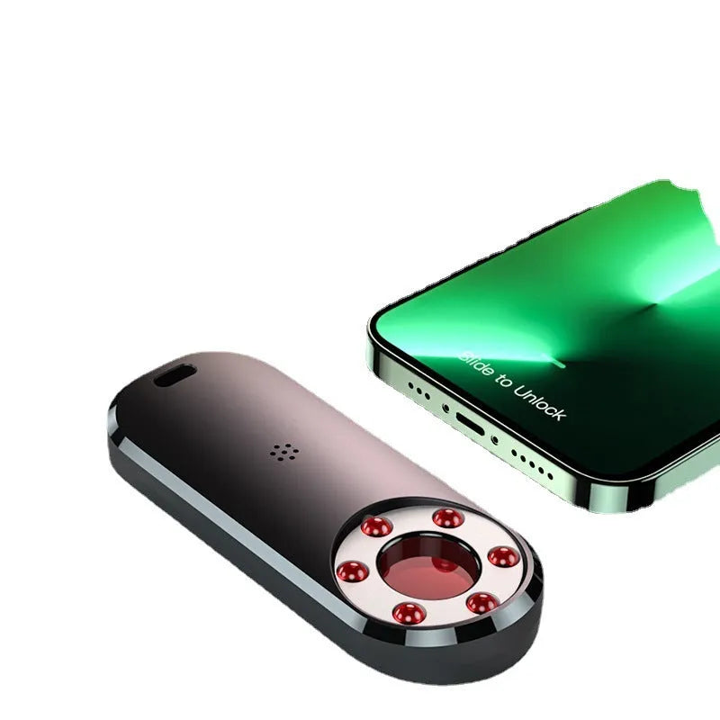 AK400 portable anti-spy detector showing compact design with frequency detection capabilities