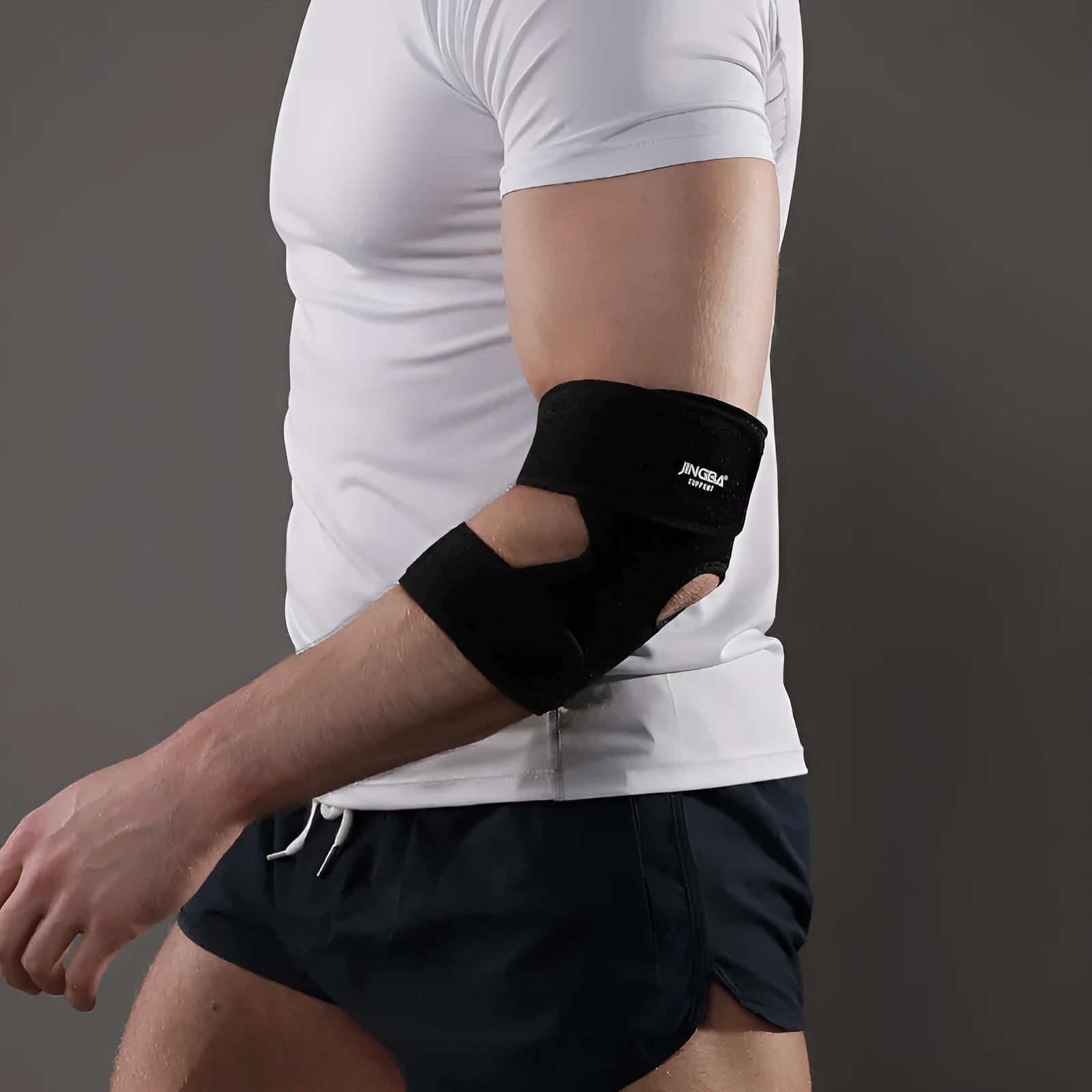 Black adjustable sports elbow guard for training and outdoor activities