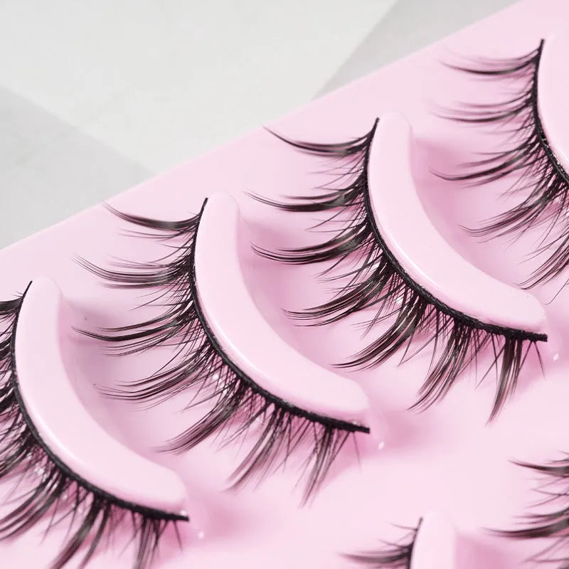 Set of manga style false eyelashes showing natural slim length styles 007, 008, and 009 on black plastic bands.