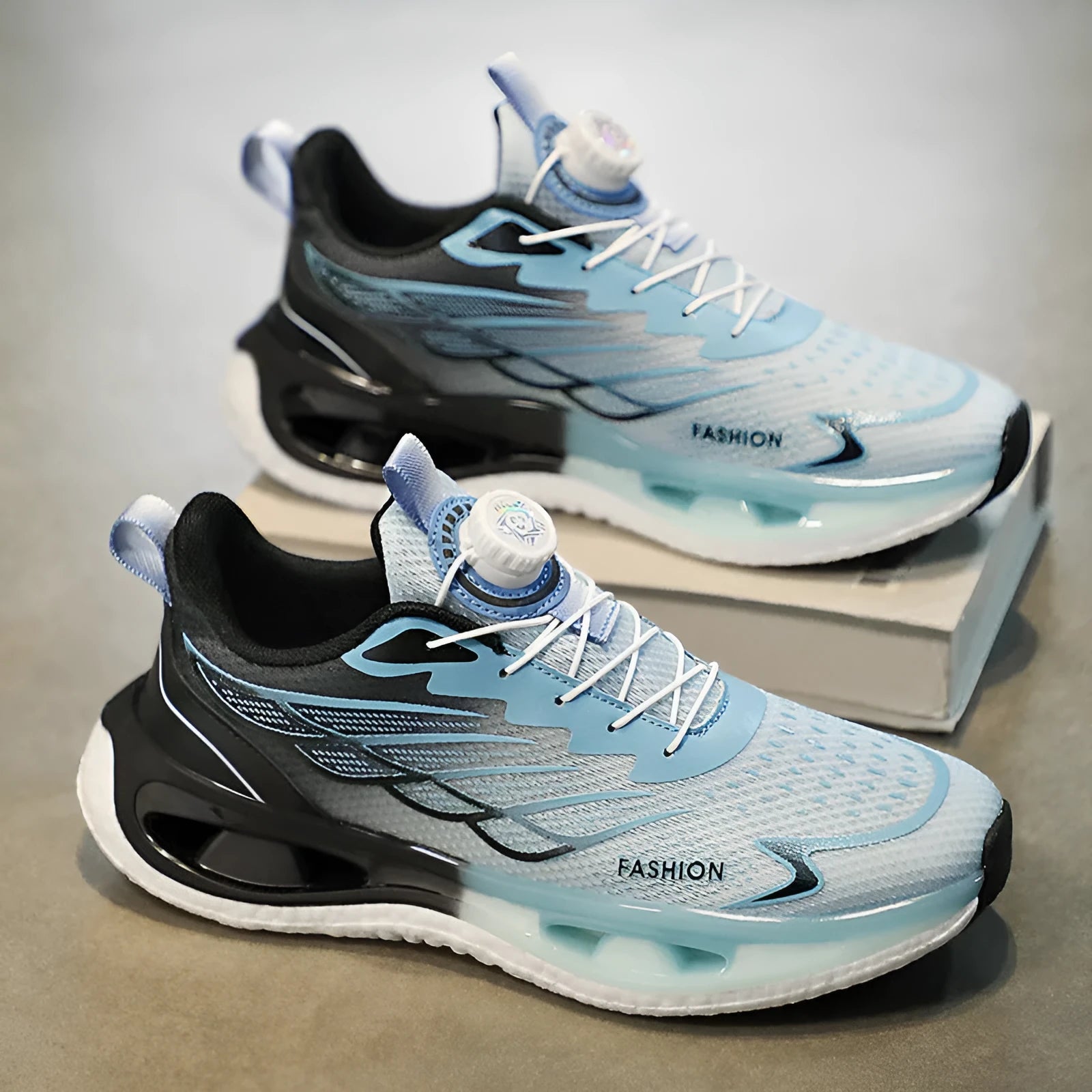Low-top shock absorption rotating button sneaker in light blue mesh with a rubber sole.