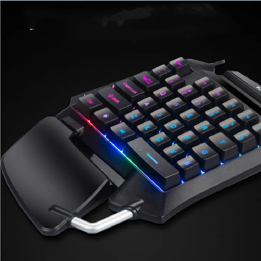 Black left-hand one-handed gaming keyboard for desktop PC with compact layout and USB cable.