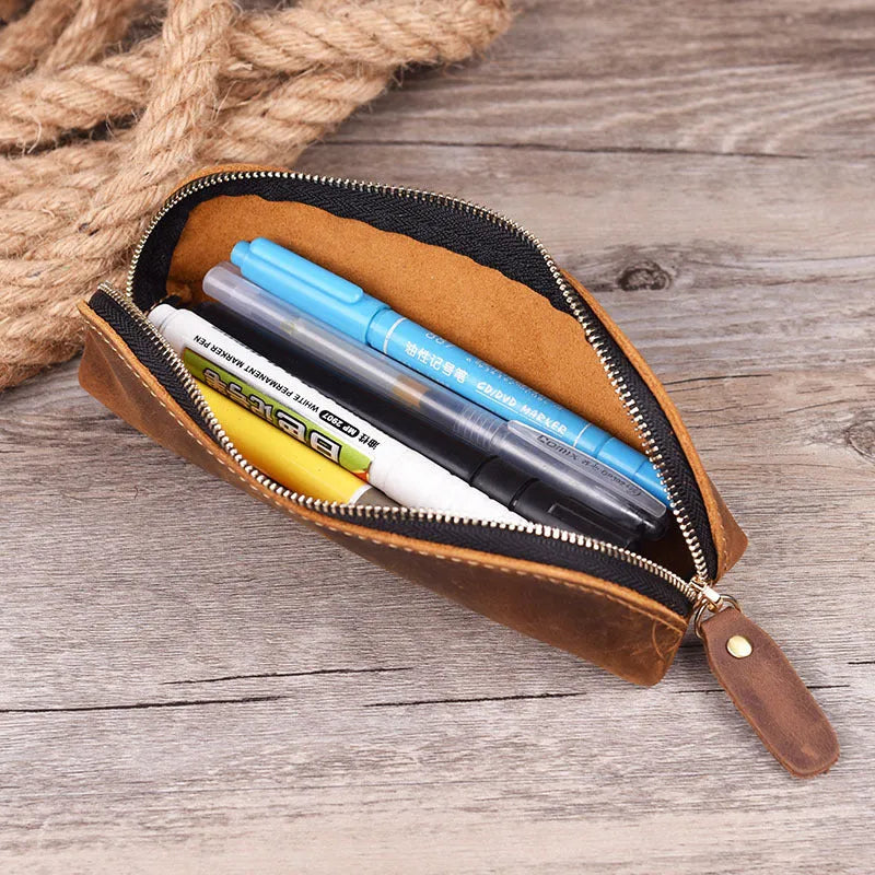 Genuine cowhide leather pencil case with zipper, 18cm long, in black solid colour