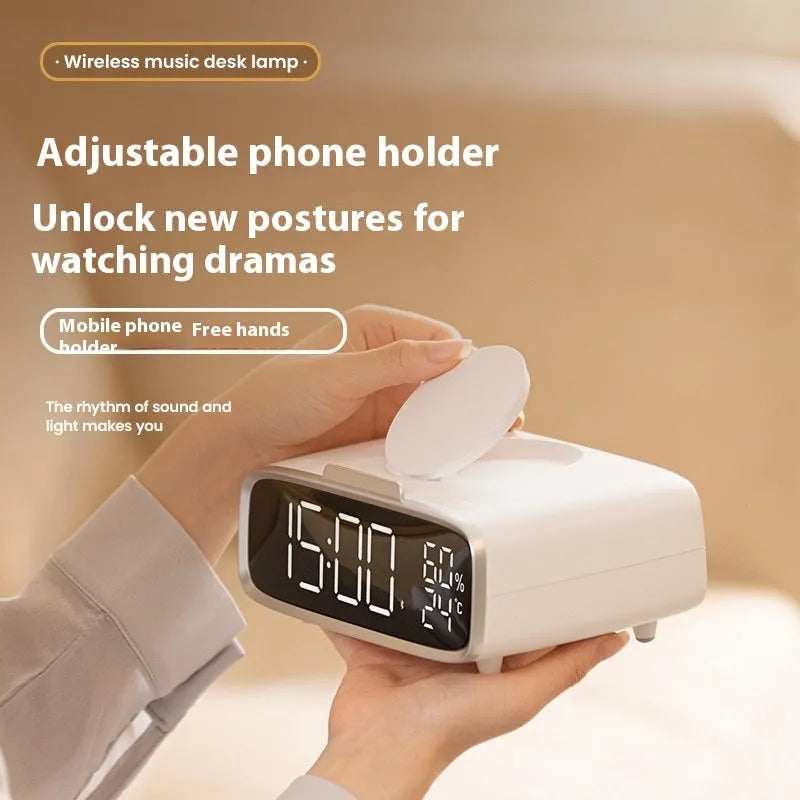 White ABS acrylic Bluetooth speaker with wireless charging pad and integrated night lamp