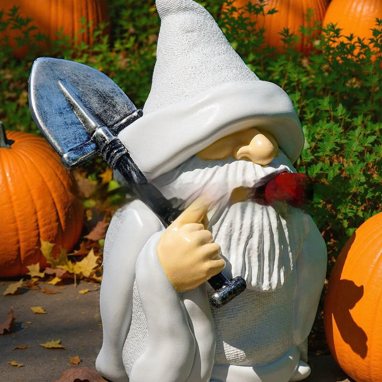Christmas garden ornament featuring smoking shovel dwarf design in resin and plastic construction