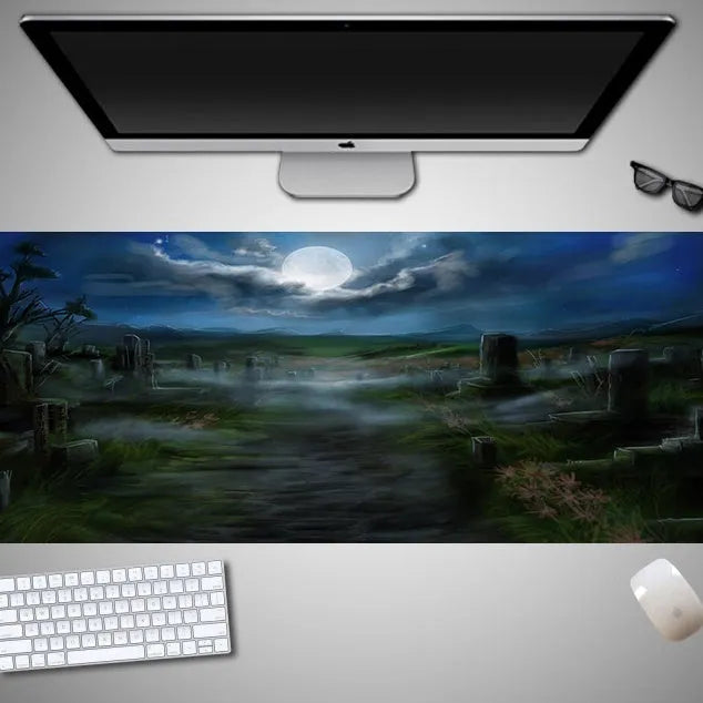 Oversized Halloween-themed rubber cloth mouse pad on a desk, showing non-slip base and large surface area.