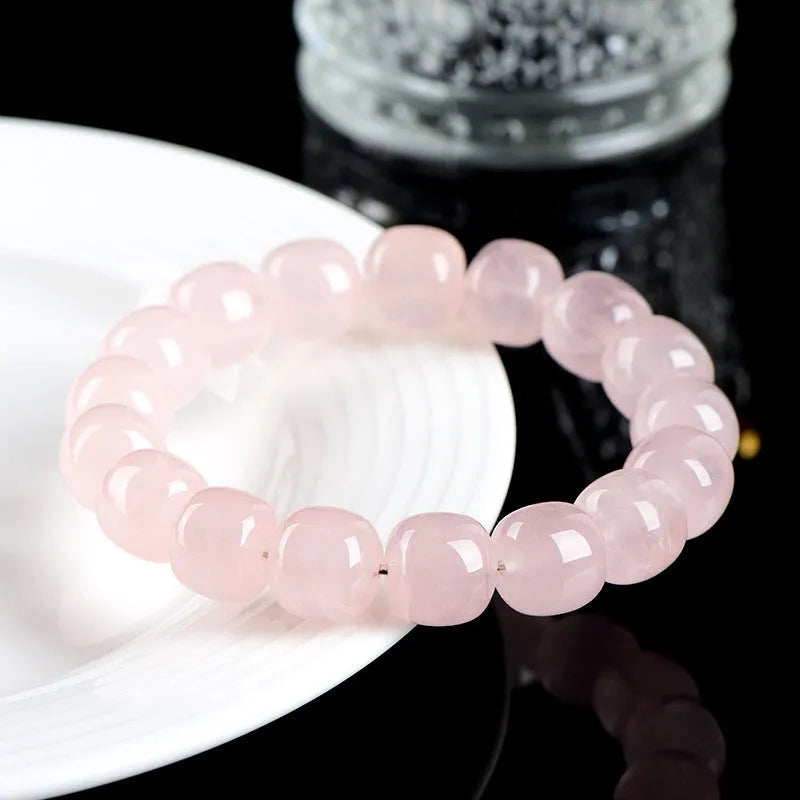 Pink crystal and bamboo bracelet with 11-12mm barrel beads and geometric design