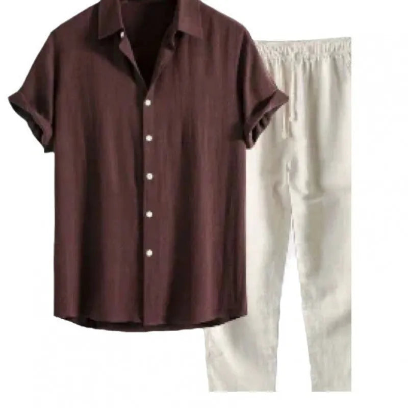 Man wearing a light blue loose-fit short-sleeve shirt and matching trousers from the casual set