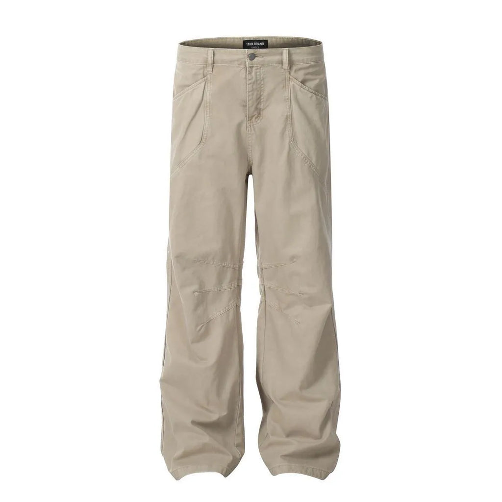 Men's brown loose straight wide-leg high-waisted cotton trousers laid flat.