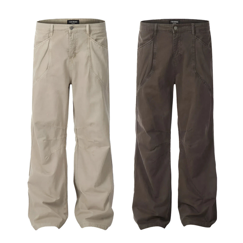 Men's brown loose straight wide-leg high-waisted cotton trousers laid flat.