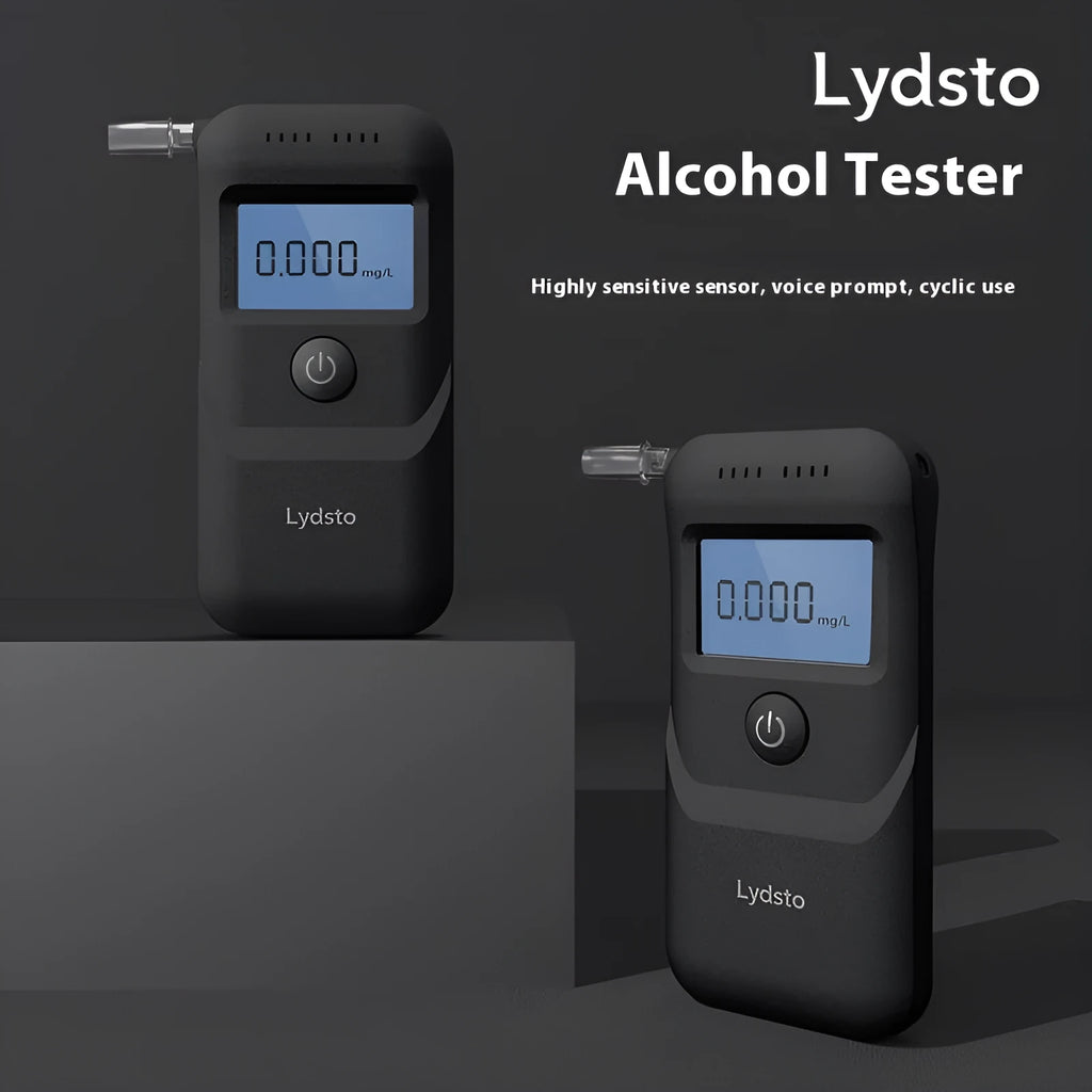 Black household alcohol tester with digital display for breath checking