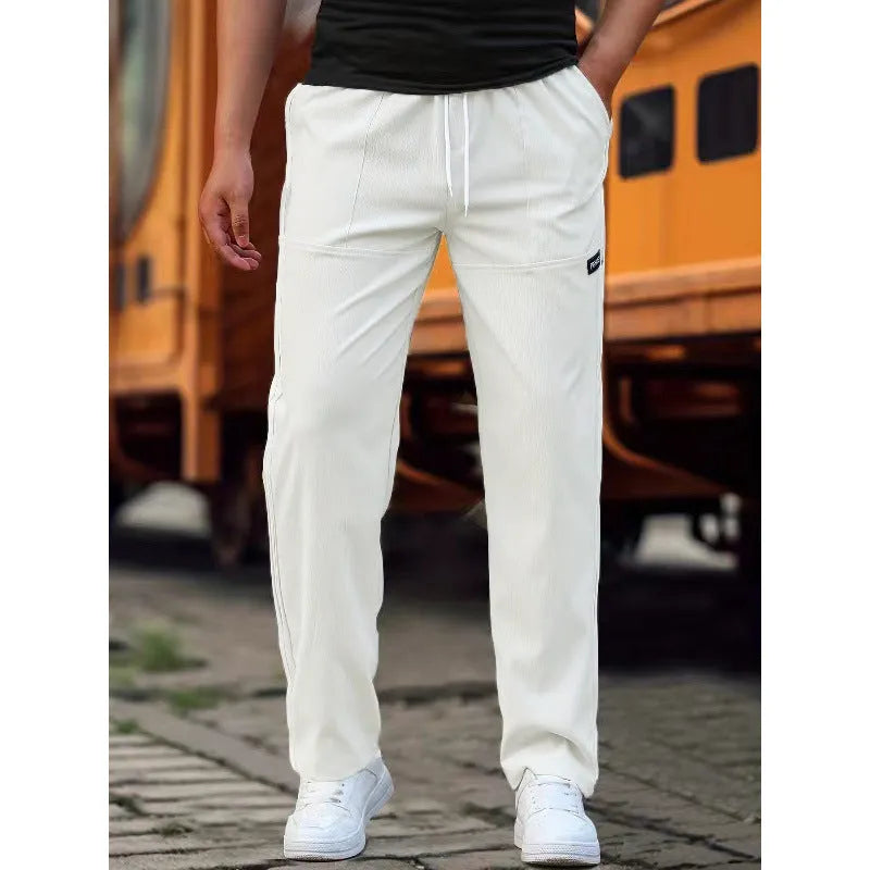 Men's lightweight polyester trousers for spring and autumn in light grey colour